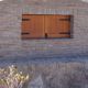 Fachada exterior con ladrillo rústico en la Yeguada la Peña de Bejar